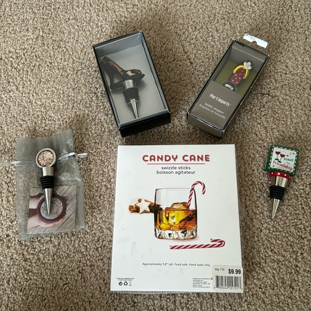 4 Wine Stoppers and 12 Candy Cane swizzle sticks